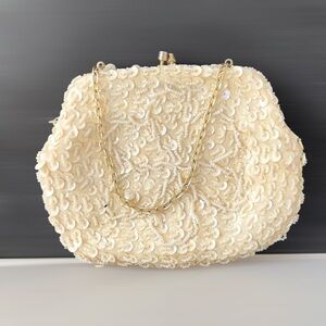 Mister Earnest Ivory Beaded Clutch with Ornate Design and Chain Strap